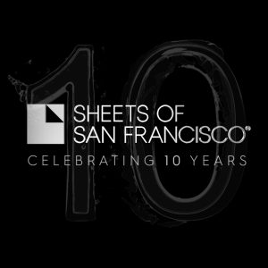 Silver Sheets of San Francisco logo on a black backdrop with Celebrating 10 years and a large figure 10 looking like water